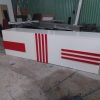 Quầy lễ tân 3m5 màu trắng đỏ gỗ MDF mới 95%