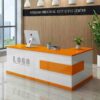 Bàn quầy lễ tân 2M4*1M2 trắng phối cam sang trọng