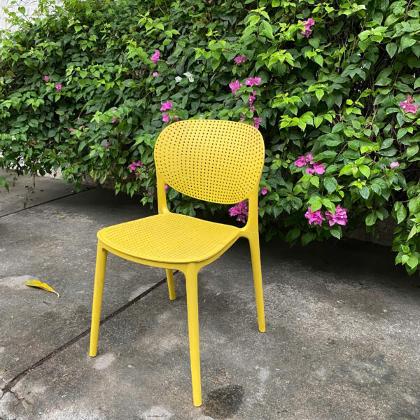 Ghế ăn, ghế cà phê nhựa đúc lỗ màu vàng như mới