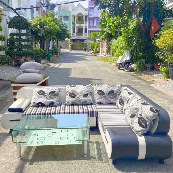 Bộ sofa da chữ L kèm bàn kính cao cấp như mới